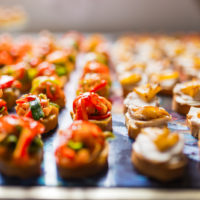 Rows of delicious canapes placed on a tray